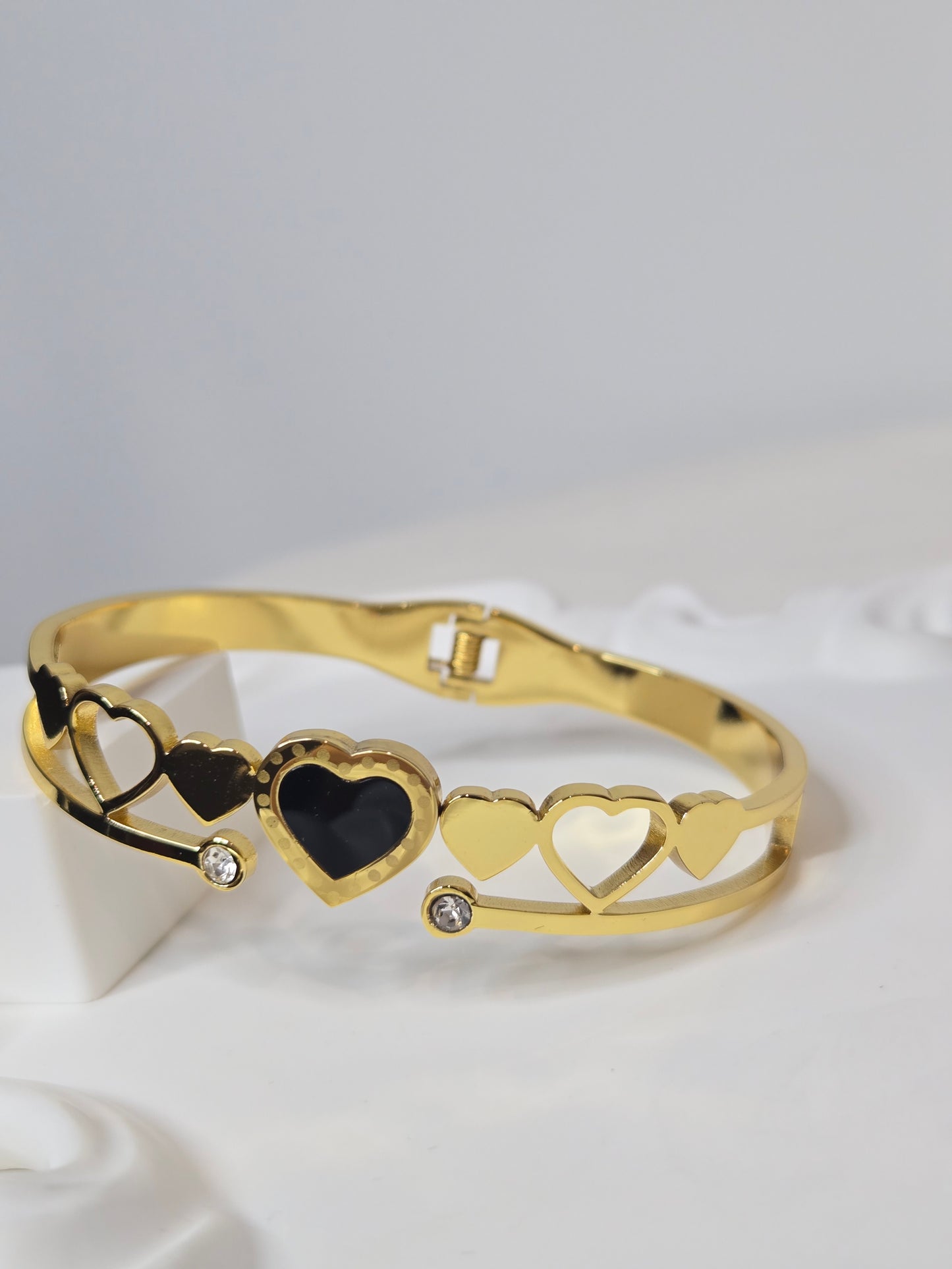 Cut Hearts Bangle Bracelet