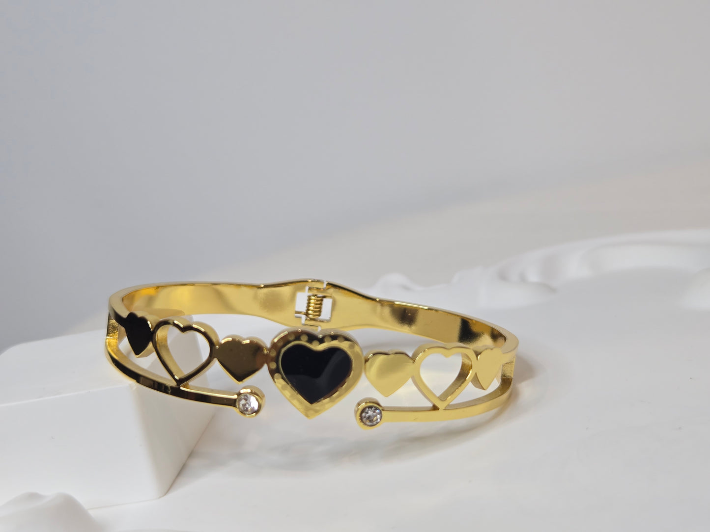 Cut Hearts Bangle Bracelet