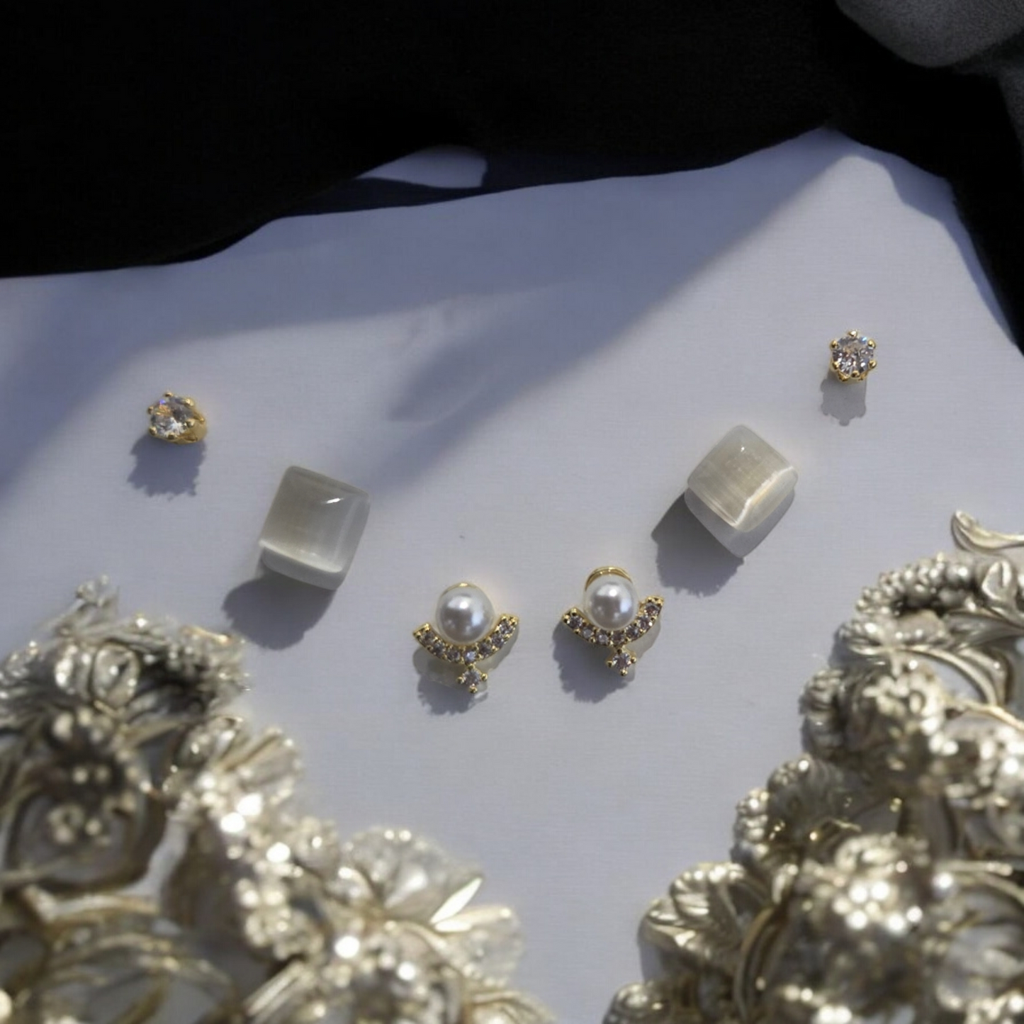 Three peice white stone studs set